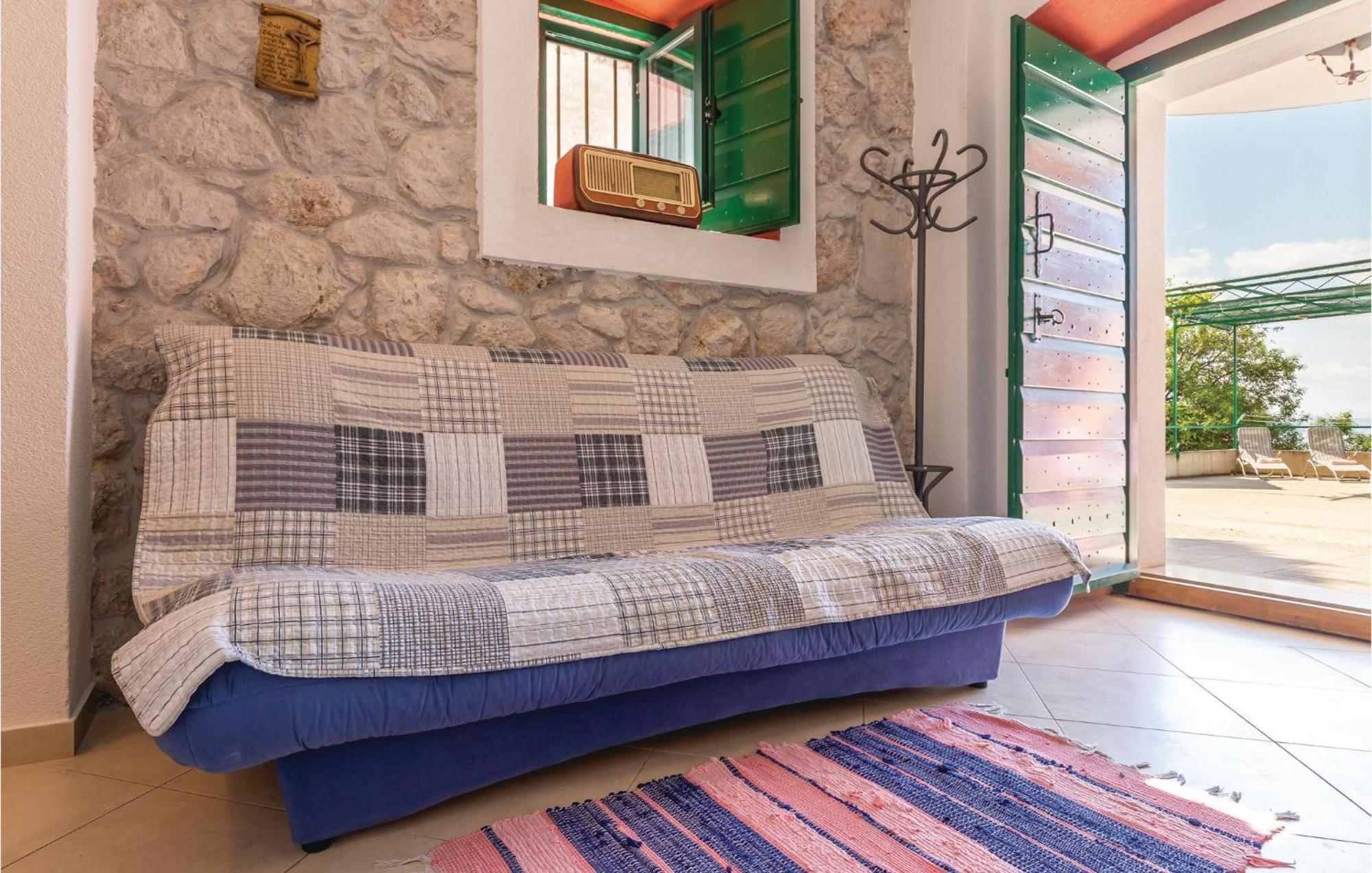 Awesome Home In Podgora With Kitchen Exterior photo